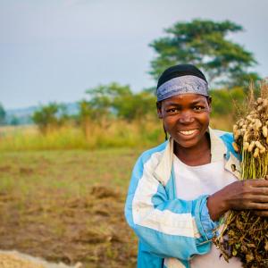 Feed the Future is helping increase opportunities for smallholder farmers like Alice Monigo in Uganda by providing trainings for women.  Photo by CNFA.