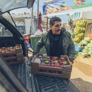 Hussein Ahmad Qararya is a strawberry vendor in West Bank. 