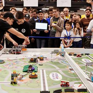 Photo: Moldovan youth compete in a robotics competition.